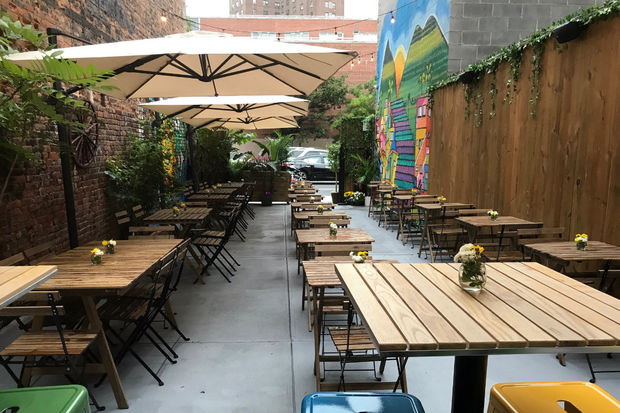  A vacant lot on 120th Street is now an outdoor Brazilian restaurant. 